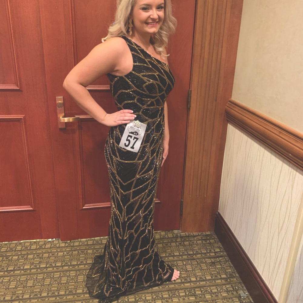 Unique,One shoulder black and gold/bronze.